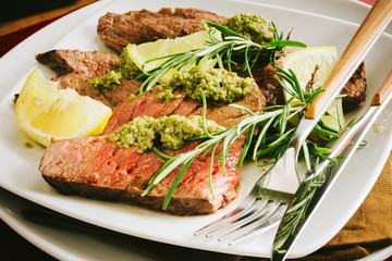 Cut beef served with Genoese pesto