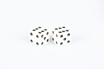 Two white gaming dice on white background