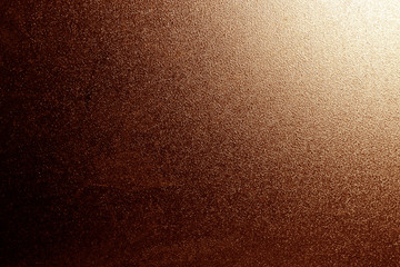 Fototapeta na wymiar Ground glass texture in brown with light in corner