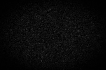 Fototapeta premium Close Up Asphalt Cracked Road Background Texture Wallpaper. Dark tone.