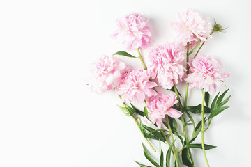 beautiful bouquet of peonies on a white background. space for text. flat lay, top view
