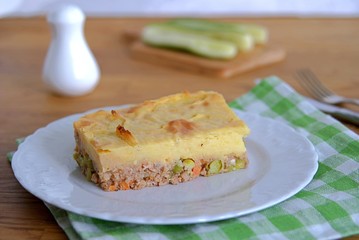 Portion of shepherd's pie, a traditional British casserole with mashed potatoes, meat and vegetables.