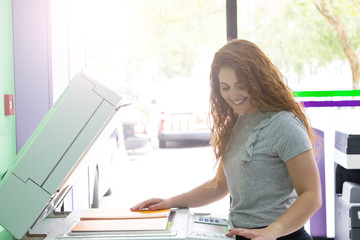 Young student at a copy center