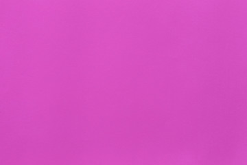 surface of pink art paper background.
