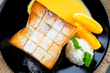 Toast and ice cream or honey toast with whipped cream