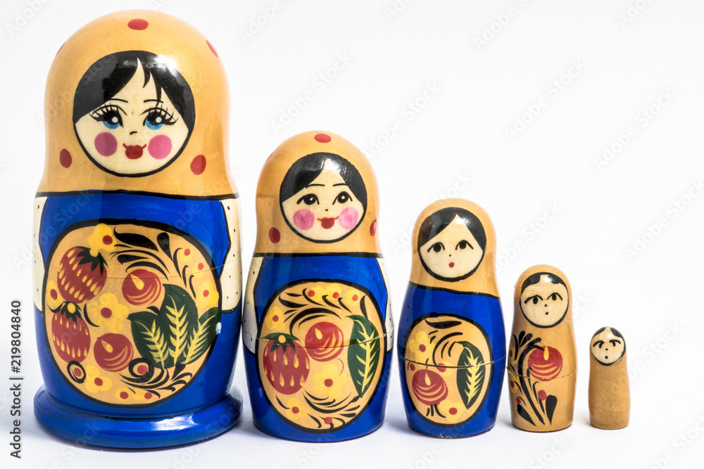 Wall mural Matryoshka family. Russian doll on a White background. Matrioska art.