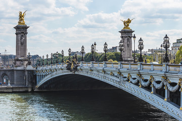 Fototapeta na wymiar The pont Alexandre III in Paris on sunny summer day