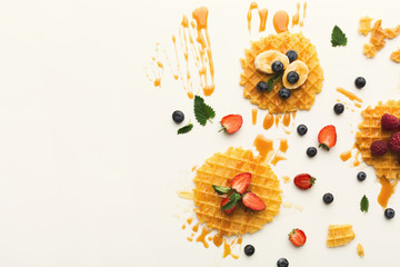 Waffles with fruits, breakfast background top view