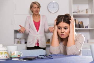 Mother scolds her adult daughter