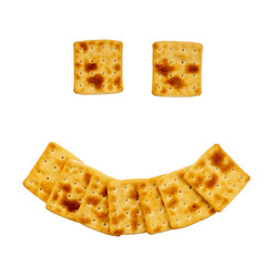 Appetizing biscuits are laid out on the table in the form of a smile. Biscuits of uneven shape without sugar isolated on white background