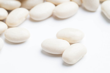 Fototapeta na wymiar heap of white beans isolated on white