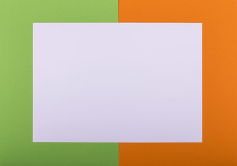 Handmade holiday square frame from white, green, orange, paper for Halloween design. Place for your text.