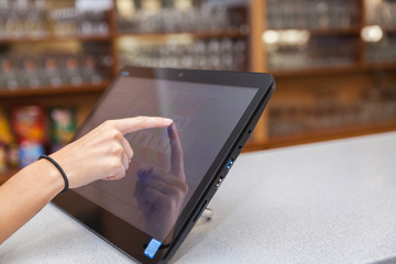 Touchscreen's cash register in the restaurant and commerce store - obrazy, fototapety, plakaty