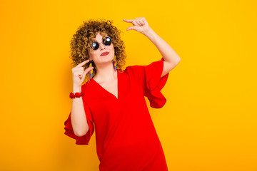 Attractive woman with short curly hair