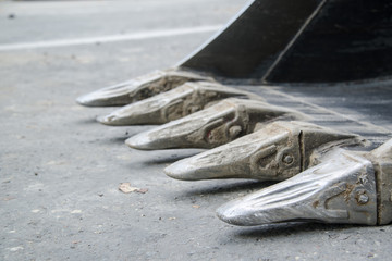 Excavator, hydraulics, tires, screws