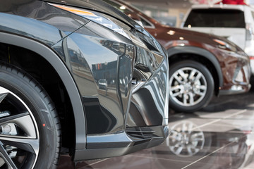 Obraz na płótnie Canvas Car auto dealership. New cars at dealer showroom. Prestigious vehicles.