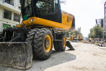 Excavator, hydraulics, tires, screws