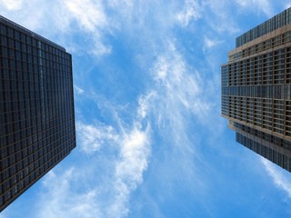 Looking up at business buildings in Tokyo,Japan