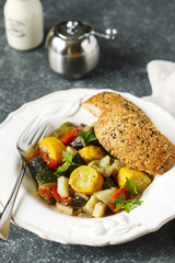 Vegetable ragout. Vegetarian stew made of zucchini, eggplants, onions, potato, and tomatoes with herbs.