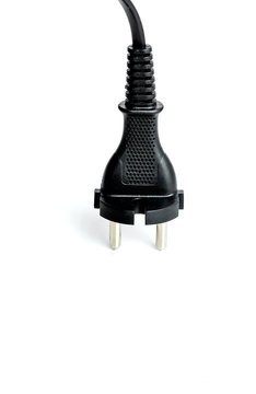 Black power cable with plug and socket isolated on white.
