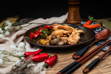 wok fried chicken stir fry with sweet peppers and chinese vegetables
