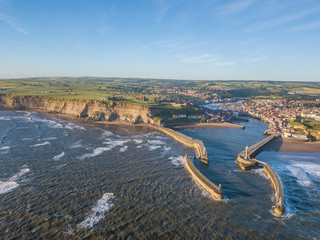Whitby view across the Harbour towards the Abbey and Town