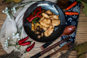 wok fried chicken stir fry with sweet peppers and chinese vegetables