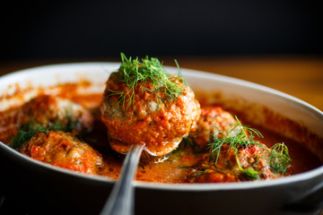 meatballs with tomato sauce on the table