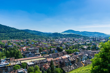 Naklejka na ściany i meble Germany, Breiburg im Breisgau surrounded by black forest mountain landscape