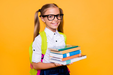 Back to school concept! Half turned close up photo portrait of lovely confident beautiful clever girl with copybook notebook wearing white blouse green bright backpack isolated vivid background