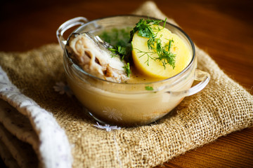 vegetable soup with fish in a glass bowl