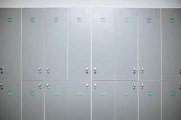Lockers in a locker room at school or in the gym.