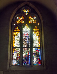 Fototapeta na wymiar Artistic stained glass windows, Santa Chiara Monastery, Naples - San Francesco