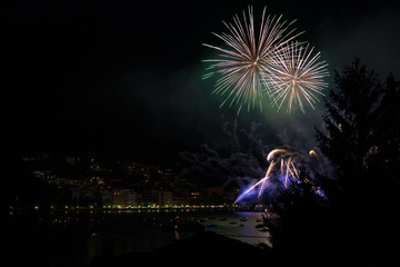 panoramic view of omegna during a fireworks display