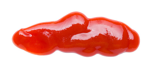 Red ketchup tomato sause closeup isolated on white background,