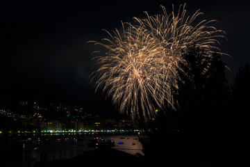 panoramic view of omegna during a fireworks display