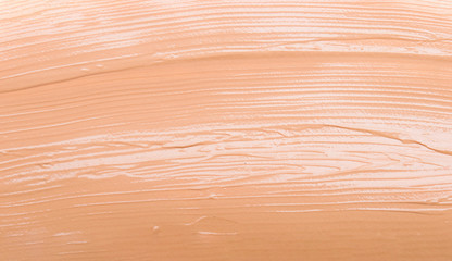 Texture of liquid cosmetic tonal foundation background
