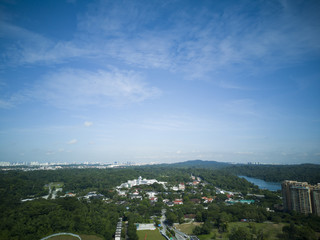 Horizontal shot of a suburb residential district with a beautiful clear blue sky
