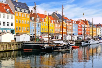 Colorful waterfront buildings and ships along the historic Nyhavn canal, Copenhagen, Denmark