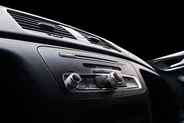 Modern Luxury sport car inside. Interior of prestige car. Black Leather. Car detailing. Dashboard....