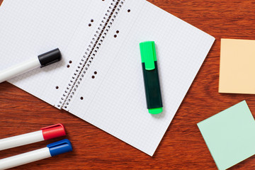 Notepad, paper, pen, pencil for study or work in the office.