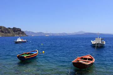 Fototapeta premium view on typical boats of Santorini, Greek island