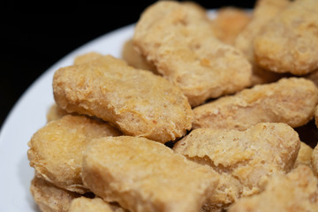 chicken nuggets on a plate