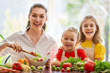 Happy family in the kitchen.
