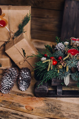 Christmas Gifts with Boxes on Wooden Background. Vintage Style. Closeup, selective focus. Toy,...