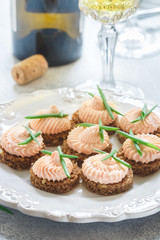 Delicious mousse of Smoked Salmon, Cream Cheese and chives on Rye Bread Slices