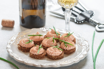 Delicious mousse of Smoked Salmon, Cream Cheese and chives on Rye Bread Slices