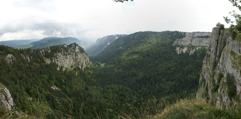 Panoramic view of Creux du Van, a rock formation like an arena in Switzerland, Neuchatel area