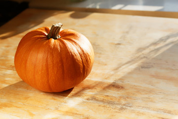 Halloween pumpkin on a wooden table