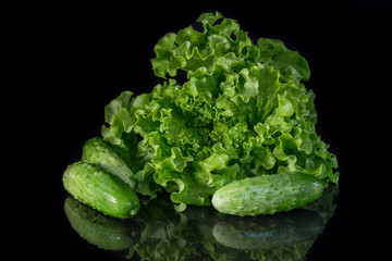 Green salad and fresh cucumbers